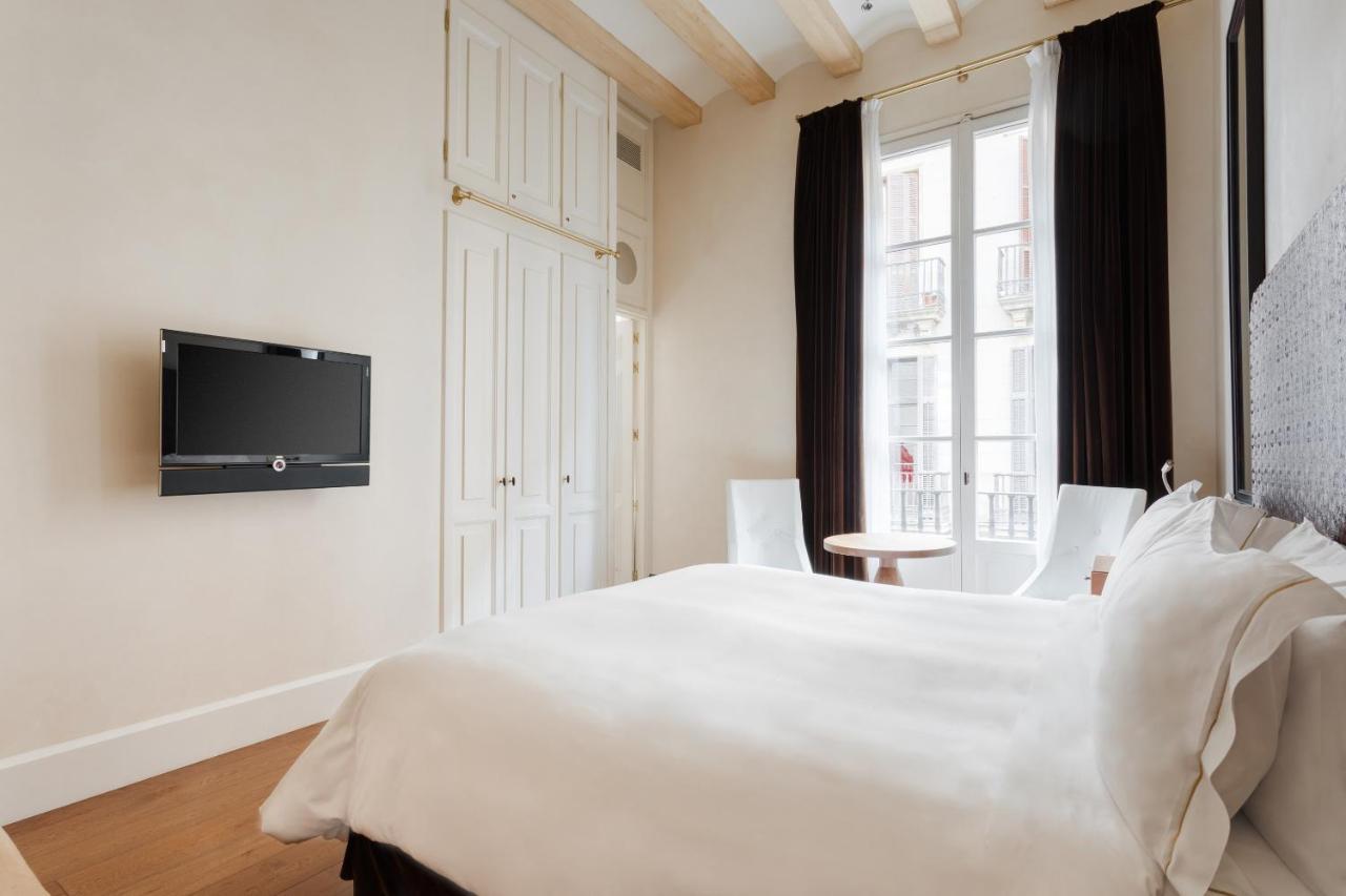 โรงแรมโดพลสคาเรียลจีแอล บาร์เซโลนา ภายนอก รูปภาพ A room at the hotel