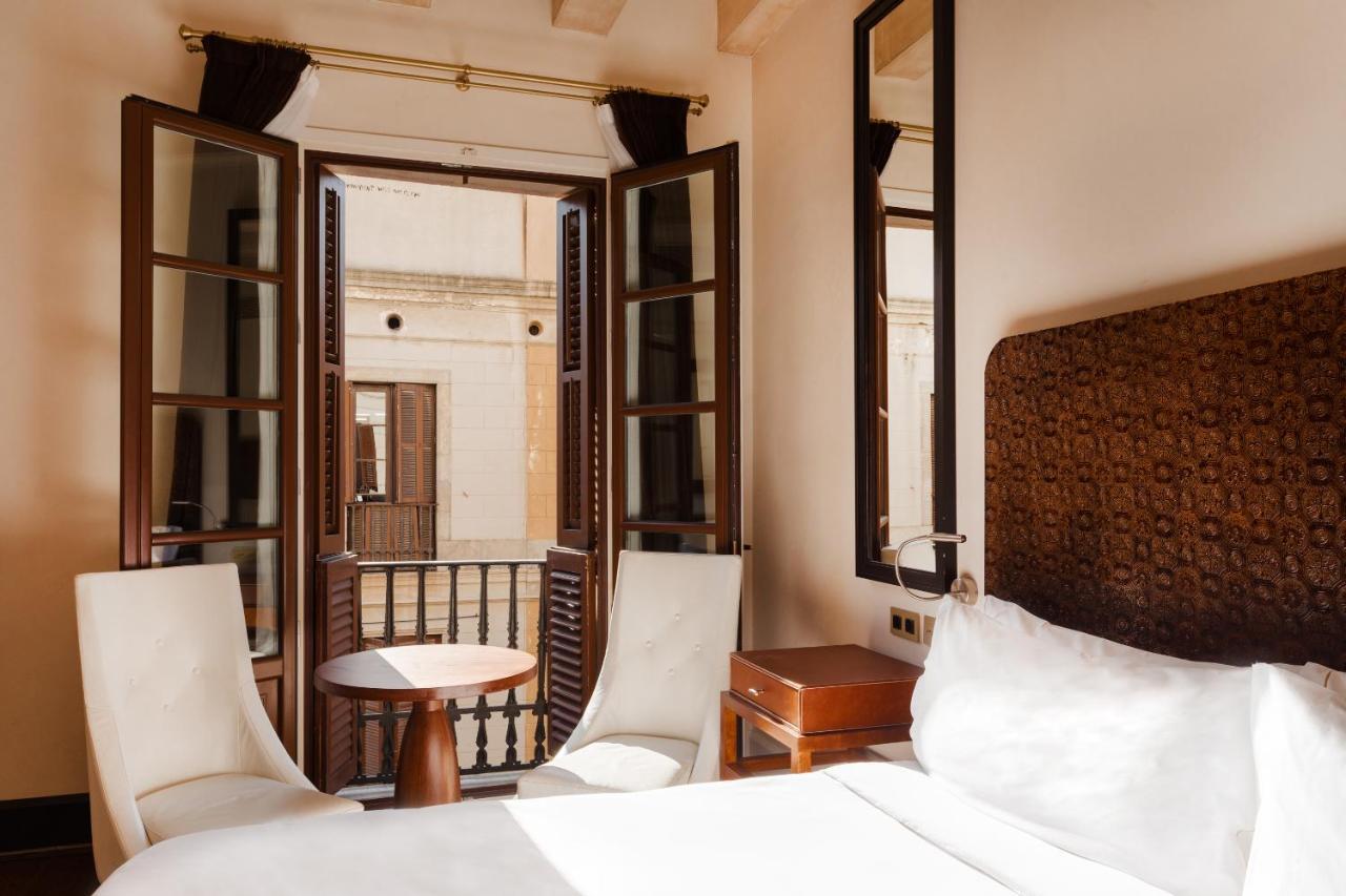โรงแรมโดพลสคาเรียลจีแอล บาร์เซโลนา ภายนอก รูปภาพ A room at Hotel Casa 1800