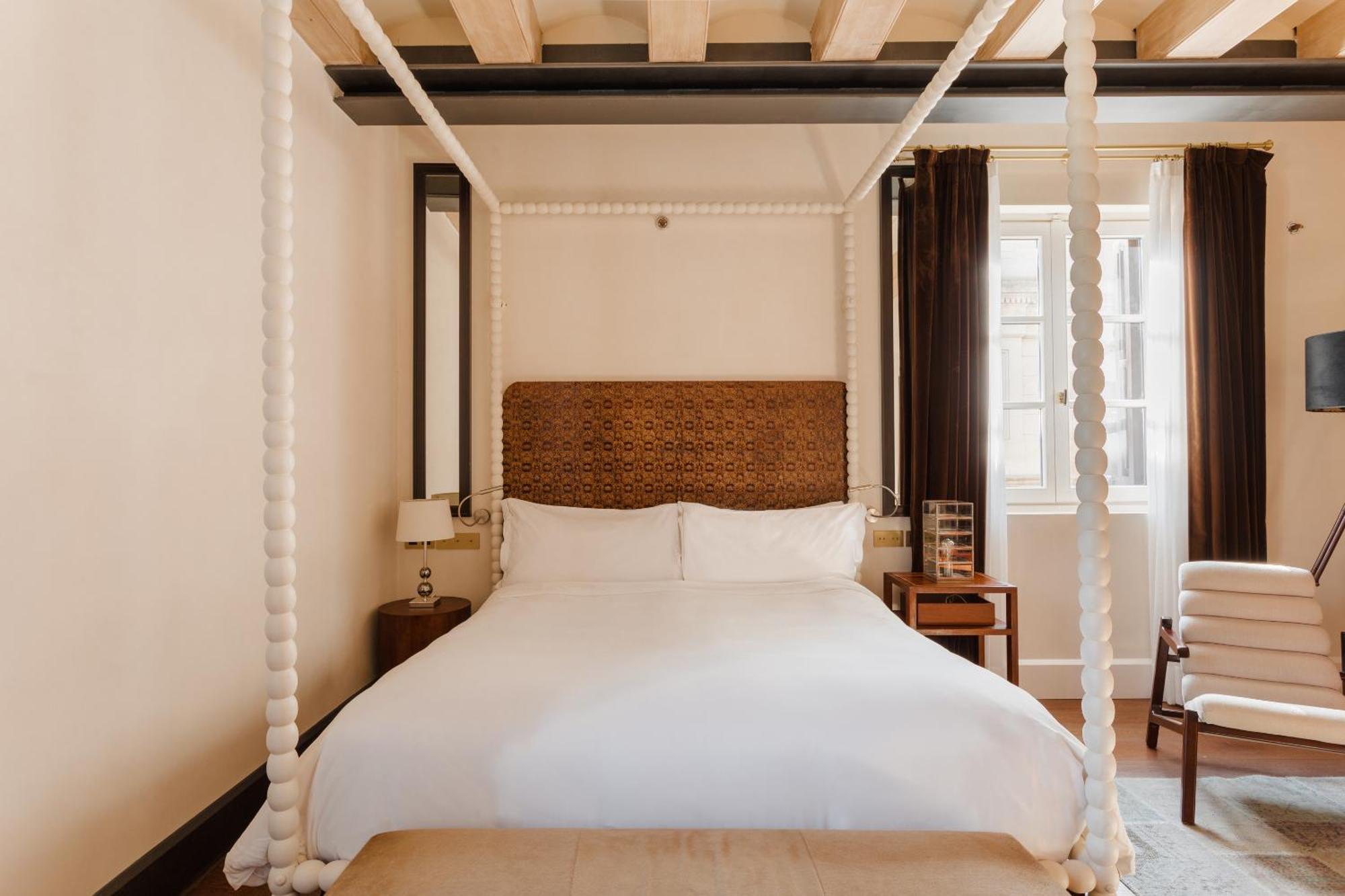 โรงแรมโดพลสคาเรียลจีแอล บาร์เซโลนา ห้อง รูปภาพ A room at the hotel