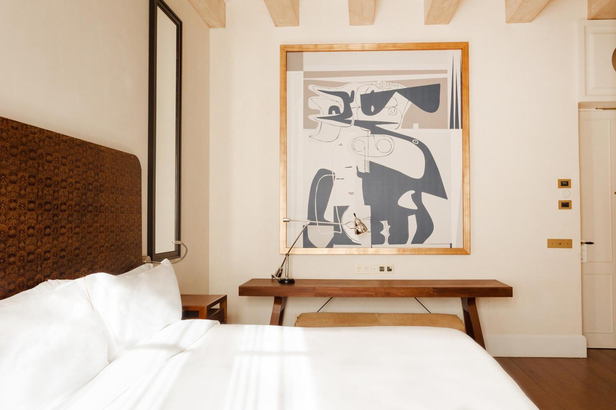 โรงแรมโดพลสคาเรียลจีแอล บาร์เซโลนา ห้อง รูปภาพ A bedroom at the Hotel Chaco