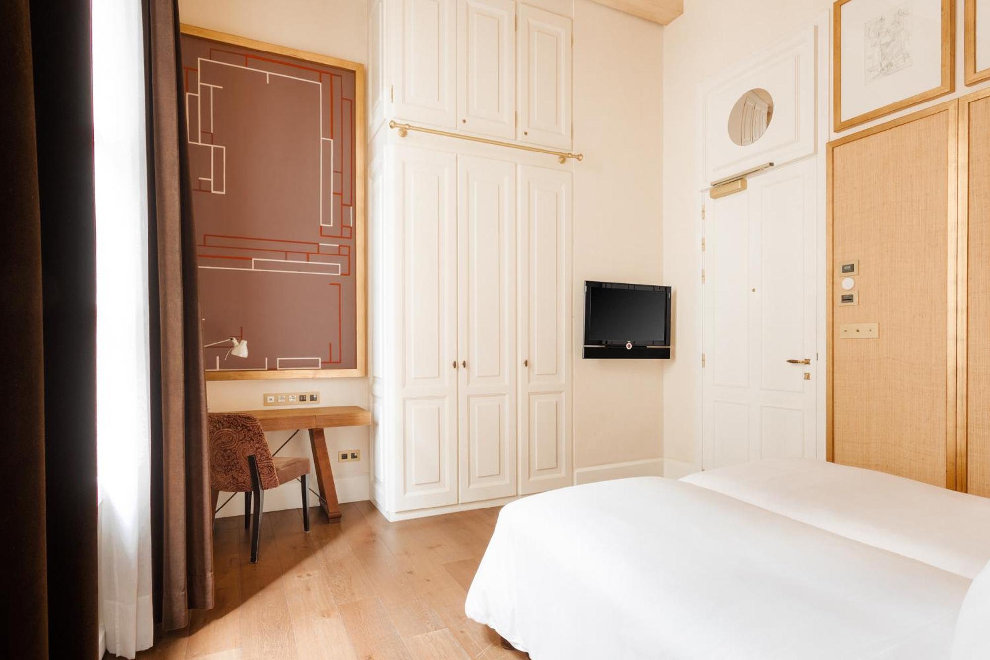 โรงแรมโดพลสคาเรียลจีแอล บาร์เซโลนา ห้อง รูปภาพ A room at the hotel